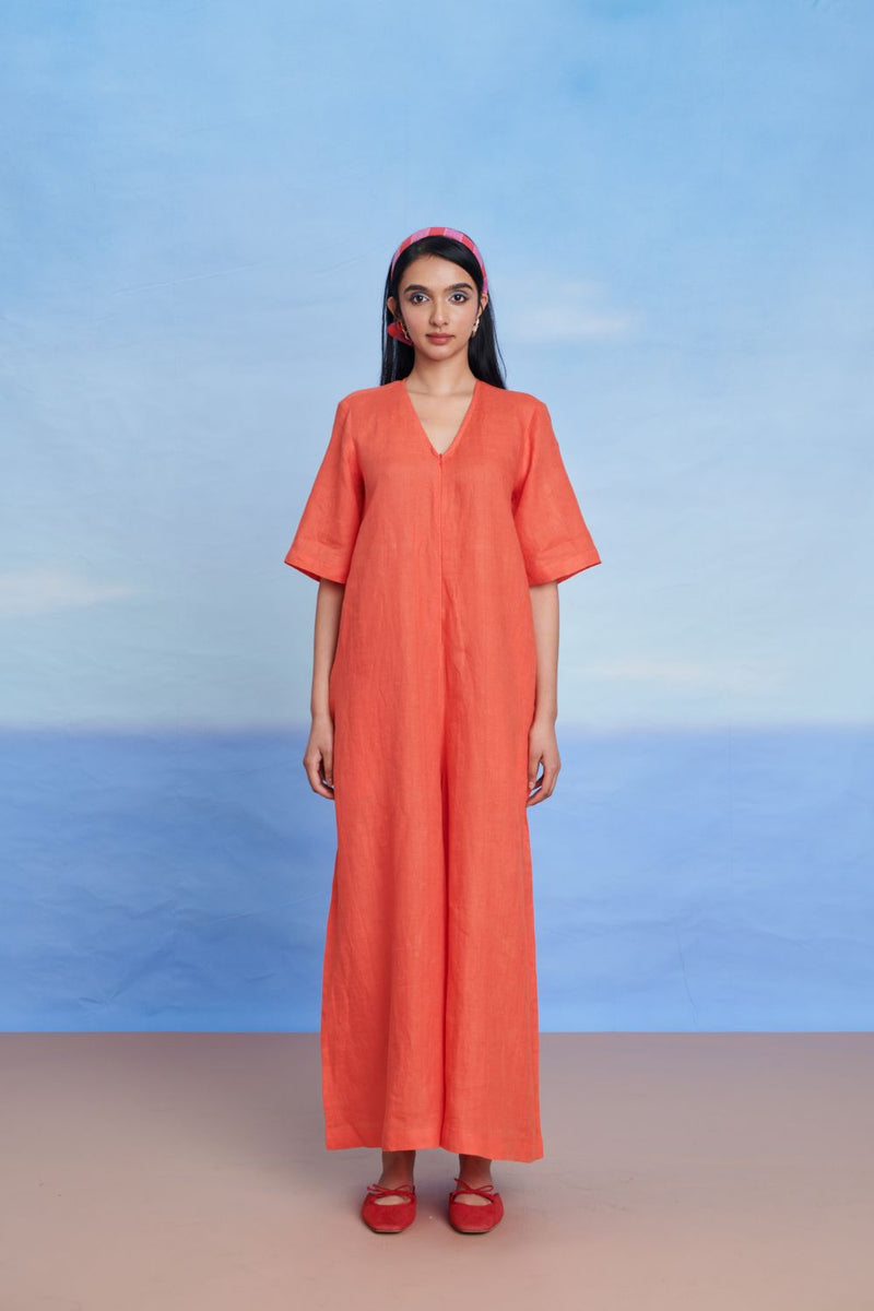 Tangerine Linen Half Sleeves Flared Jumpsuit linen by Saphed in orange color for women Worldwide