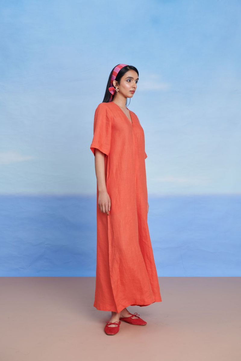 Tangerine Linen Half Sleeves Flared Jumpsuit linen by Saphed in orange color for women Worldwide