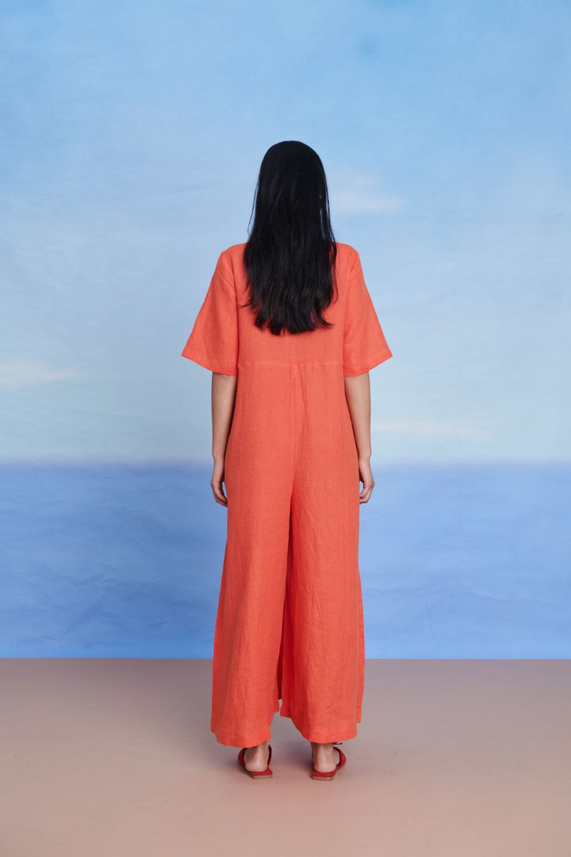 Tangerine Linen Half Sleeves Flared Jumpsuit linen by Saphed in orange color for women Worldwide