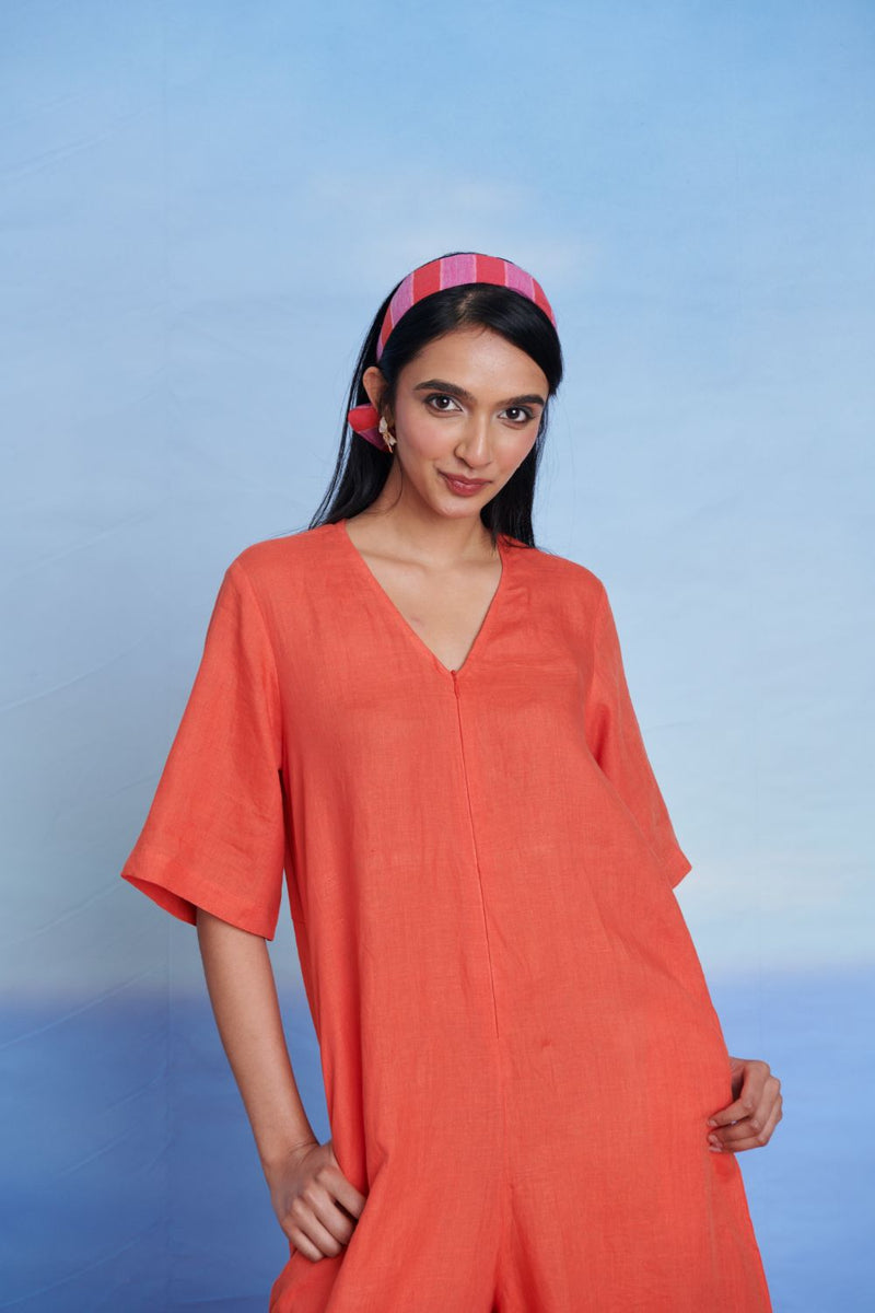 Tangerine Linen Half Sleeves Flared Jumpsuit linen by Saphed in orange color for women Worldwide
