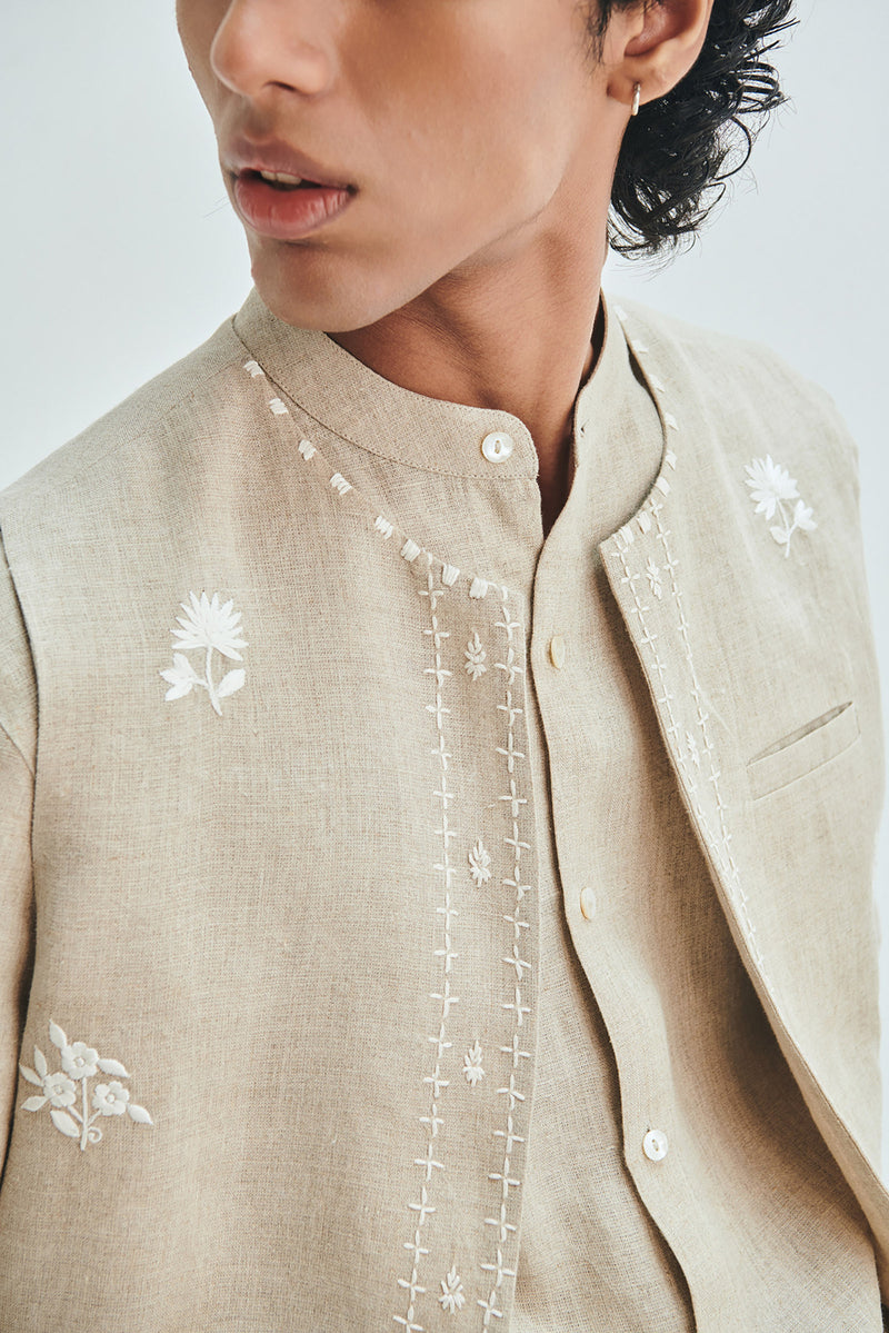 Undyed Linen Embroidered Men’s Collarless Nehru Jacket linen jacket by Saphed Men in off-white for men Worldwide