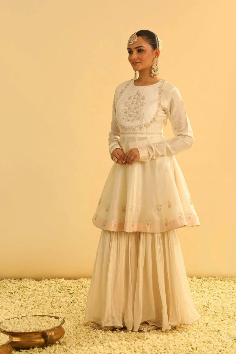 Shahana Peplum kurta with garara and dupatta-Daisy ivory silk by SHEETAL BATRA in ivory color for women Worldwide