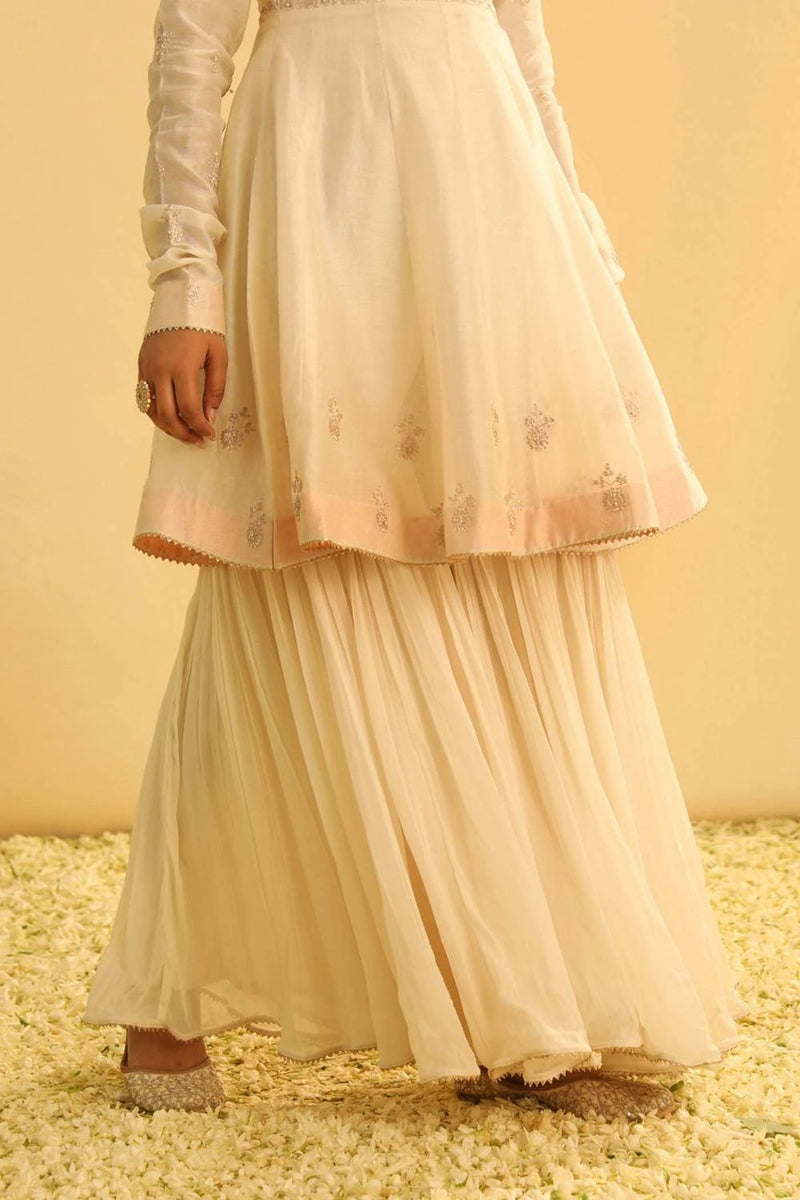 Shahana Peplum kurta with garara and dupatta-Daisy ivory silk by SHEETAL BATRA in ivory color for women Worldwide