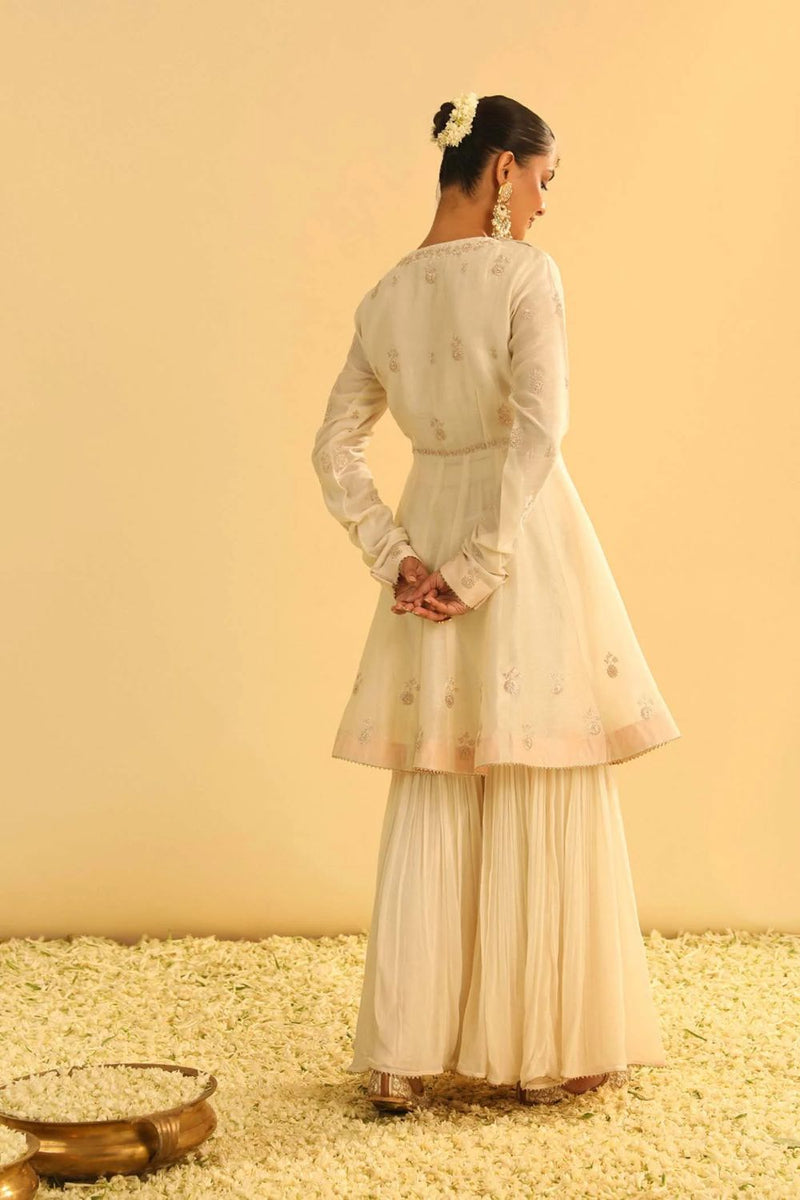 Shahana Peplum kurta with garara and dupatta-Daisy ivory silk by SHEETAL BATRA in ivory color for women Worldwide