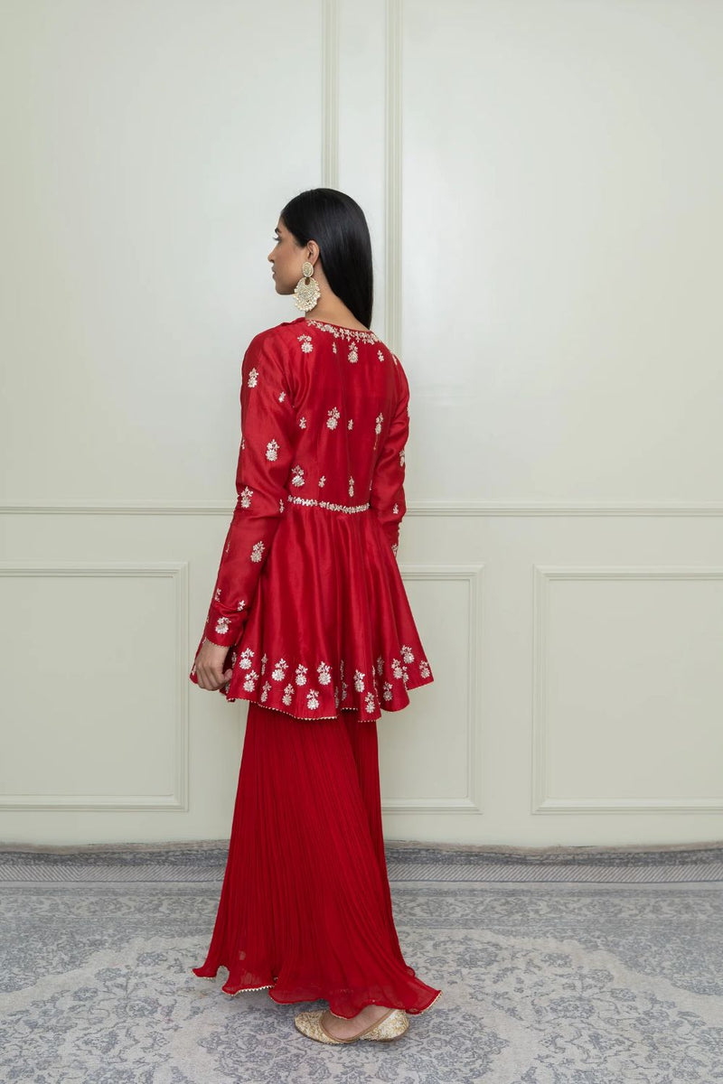 Shahana Peplum kurta with garara and dupatta-Scarlet red & pumpkin orange silk by SHEETAL BATRA in red color for women Worldwide