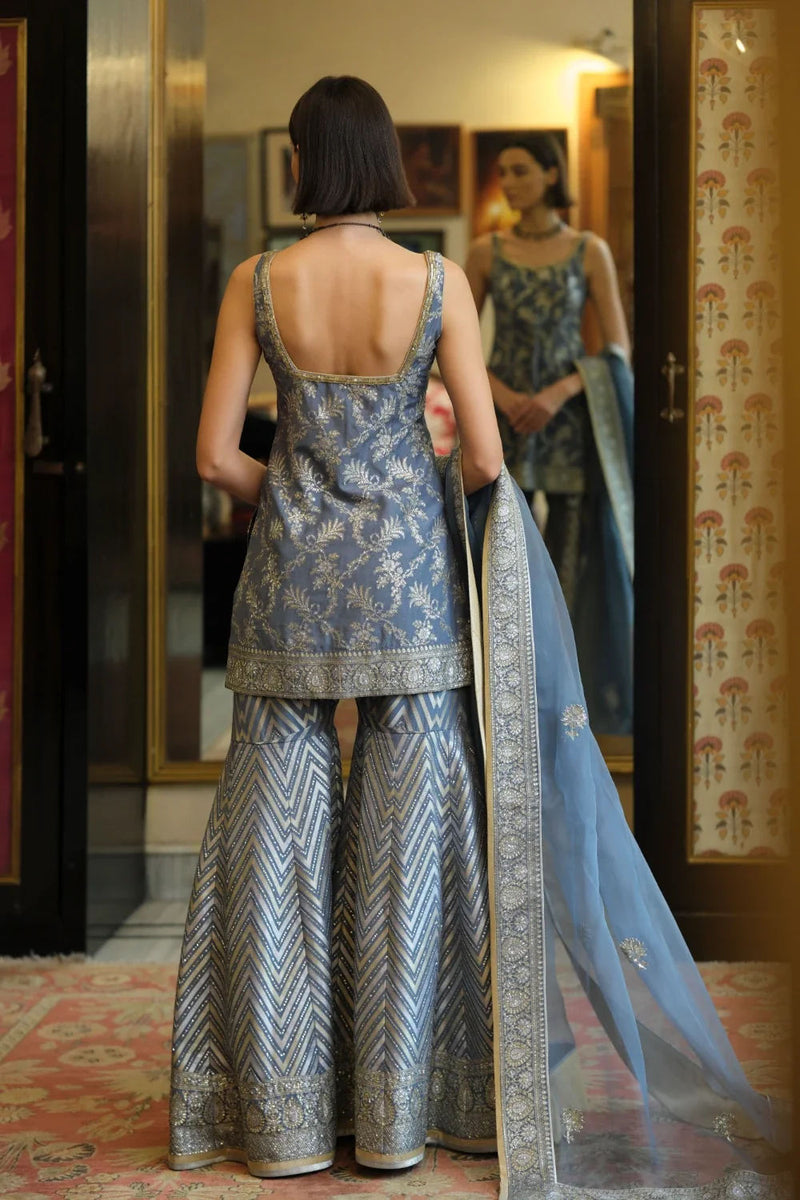 ‘Shama’ Banarasi munga silk chevron gharara georgette kurta/kurta set by Malika Mathur in blue grey for women Worldwide