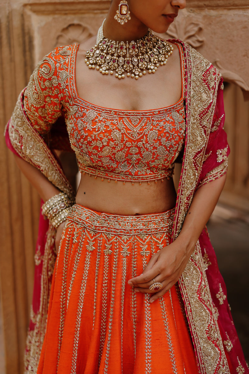 Nagma-Orange Lehenga Set With Blouse And Hot Pink Dupatta raw silk lehenga sets by SHEETAL BATRA in orange, pink for women Worldwide