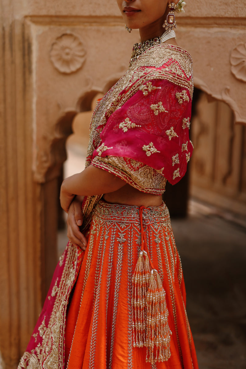Nagma-Orange Lehenga Set With Blouse And Hot Pink Dupatta raw silk lehenga sets by SHEETAL BATRA in orange, pink for women Worldwide