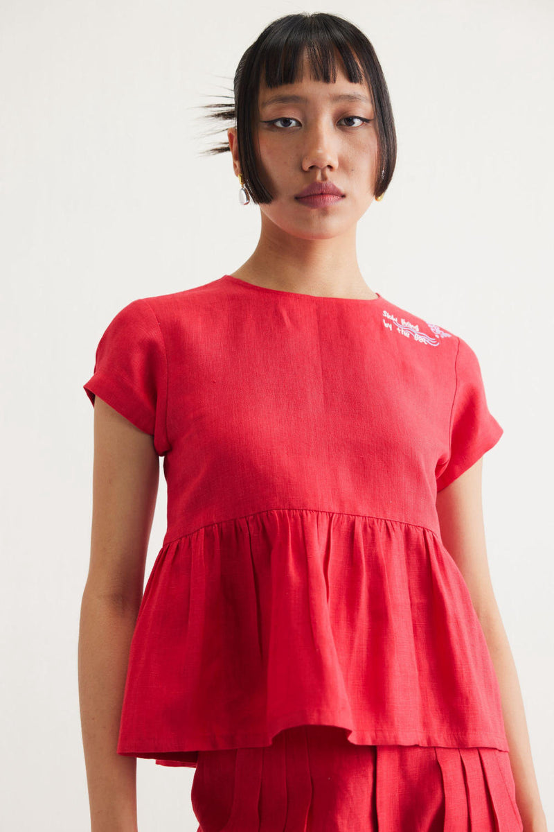 Slow Living Linen Peplum Top by SUI in red color for women Worldwide
