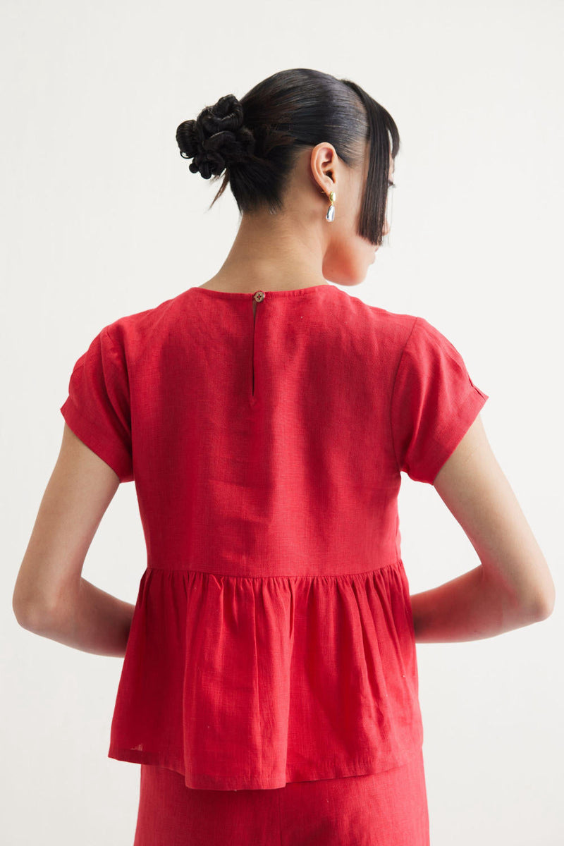 Slow Living Linen Peplum Top by SUI in red color for women Worldwide