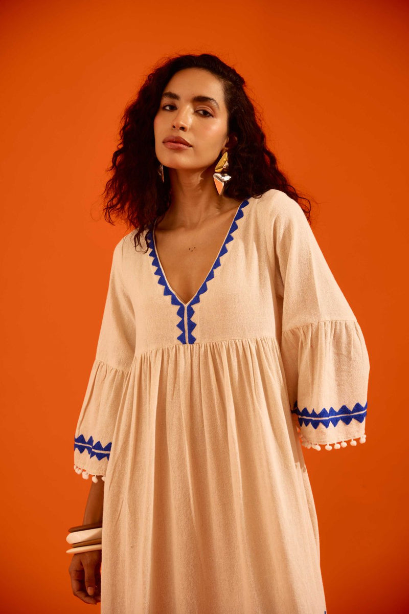Natural Jute Maxi Dress With Indigo Petal Thread Embroidery by Indian Summer Story in beige color for women Worldwide