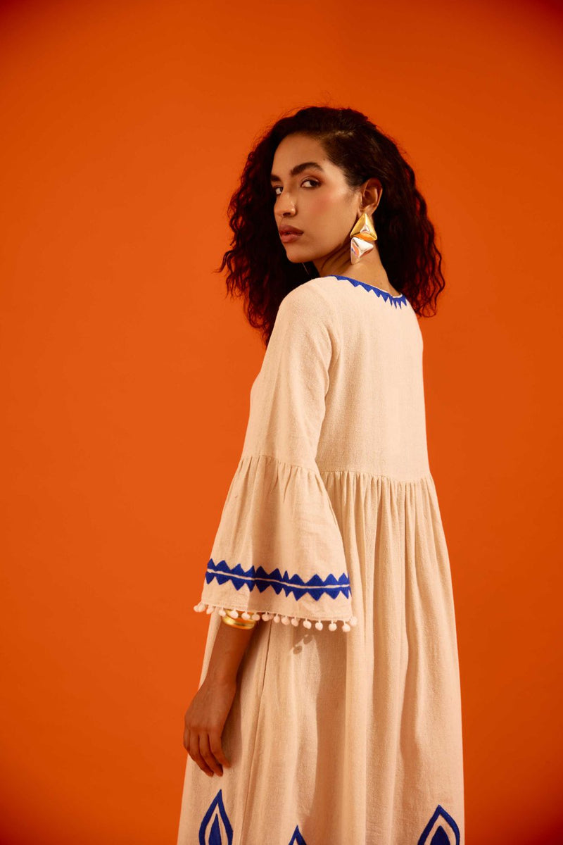 Natural Jute Maxi Dress With Indigo Petal Thread Embroidery by Indian Summer Story in beige color for women Worldwide