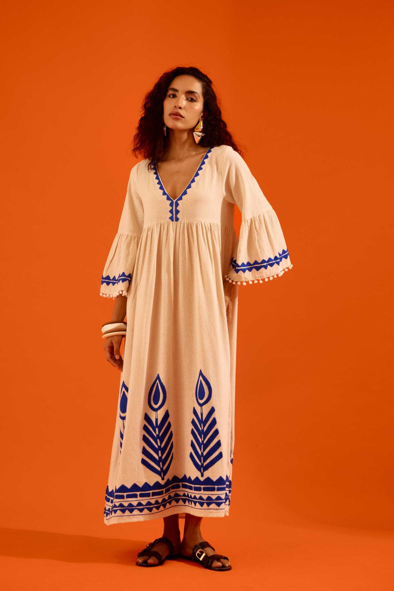 Natural Jute Maxi Dress With Indigo Petal Thread Embroidery by Indian Summer Story in beige color for women Worldwide