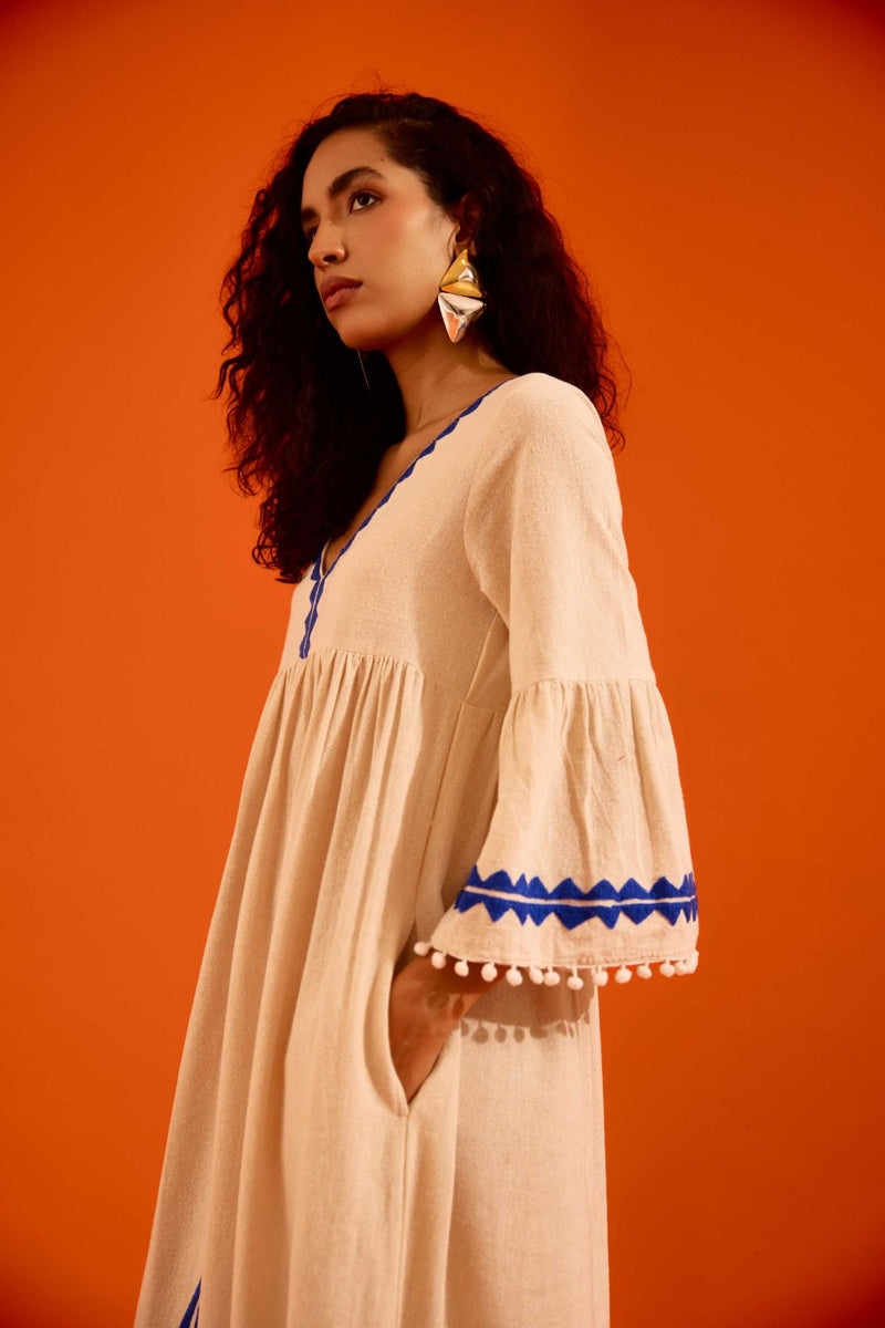 Natural Jute Maxi Dress With Indigo Petal Thread Embroidery by Indian Summer Story in beige color for women Worldwide