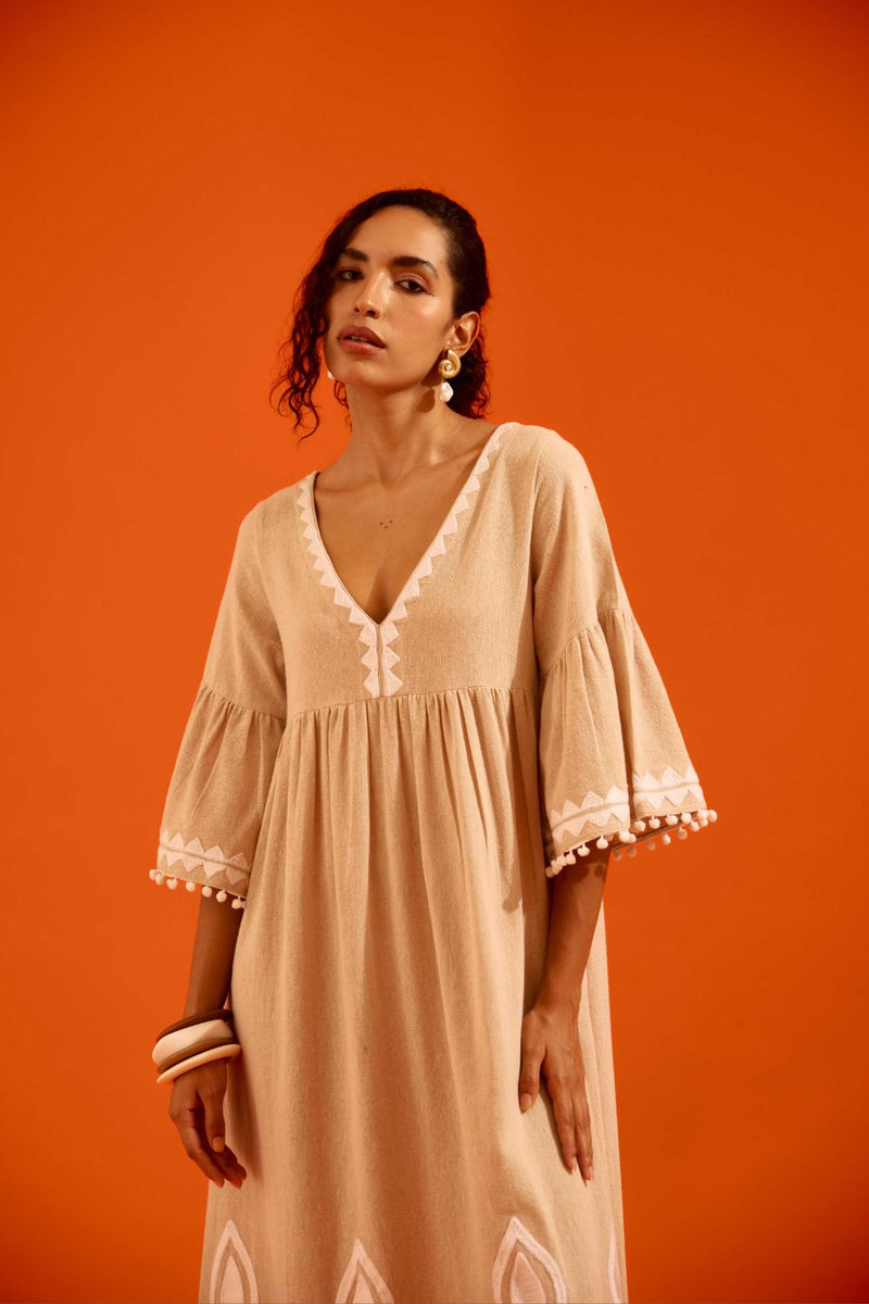 Natural Jute Maxi Dress With Ivory Petal Thread Embroidery by Indian Summer Story in beige color for women Worldwide