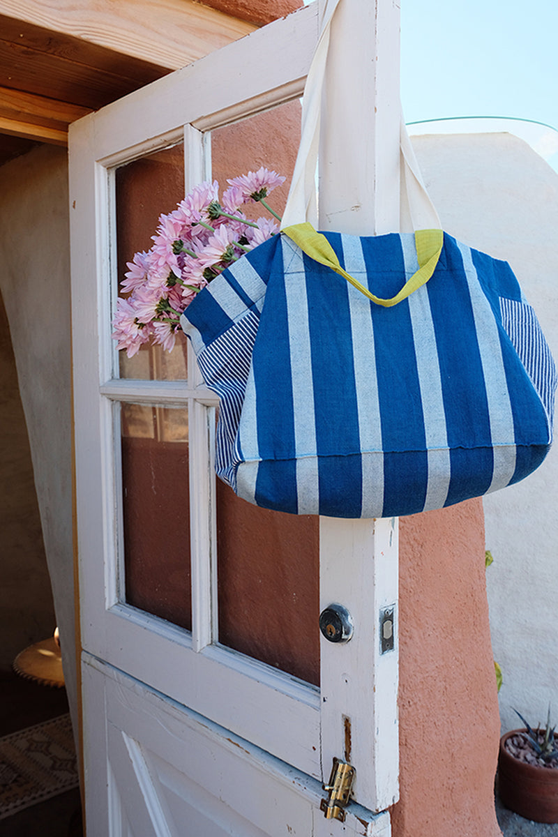 The Boat Tote-Indigo Stripe handwoven indigo khadi and fine-striped cotton bag by World of Crow in indigo,white for women Worldwide