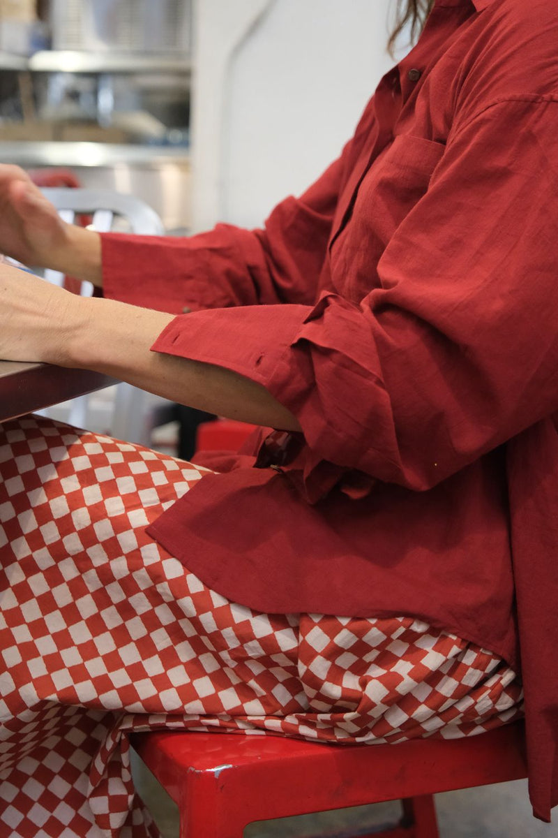 The red Button-Down Shirt cotton by World of Crow in red color for women Worldwide
