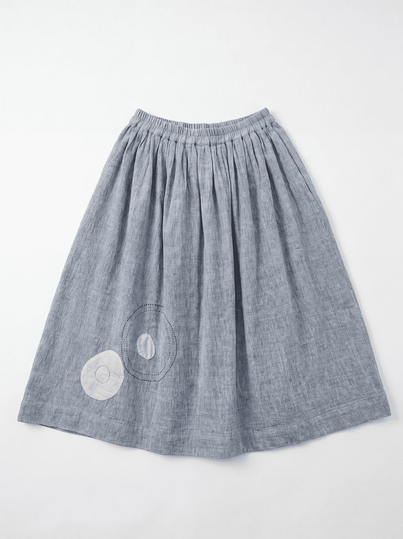 The Crayon Joy Skirt handwoven organic chambray cotton skirt by World of Crow in light blue indigo for women Worldwide