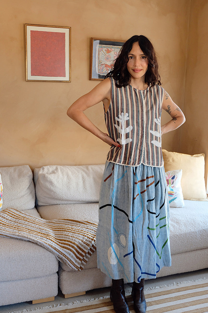 The Crayon Joy Skirt handwoven organic chambray cotton skirt by World of Crow in light blue indigo for women Worldwide