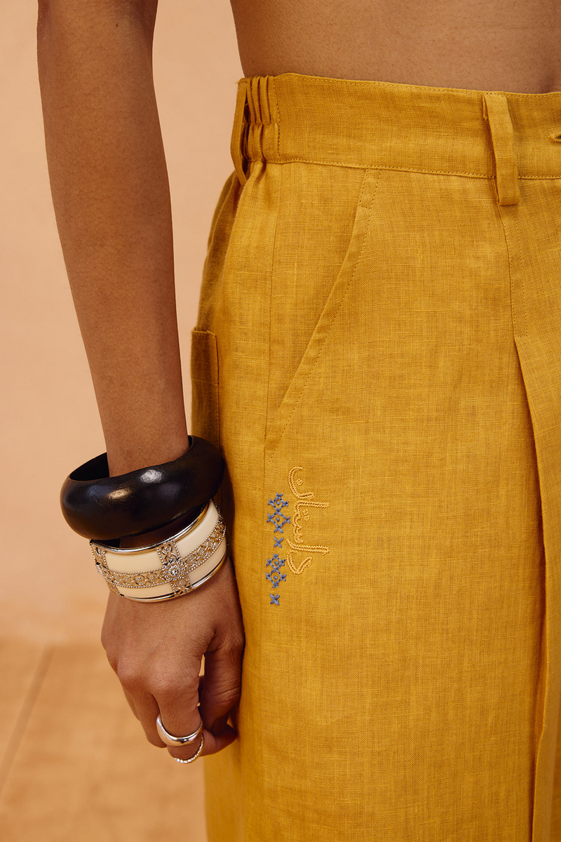 The Golden Linen Shorts 100% linen short by SUI in mustard for women Worldwide