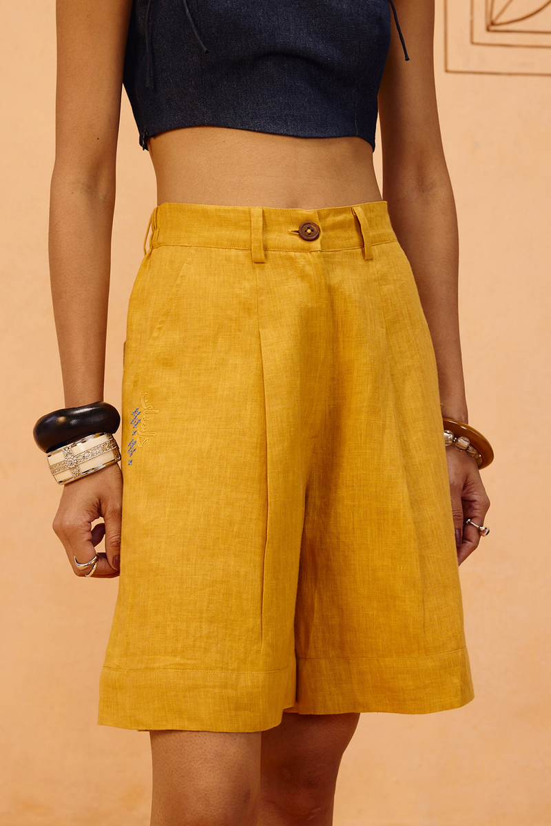 The Golden Linen Shorts 100% linen short by SUI in mustard for women Worldwide