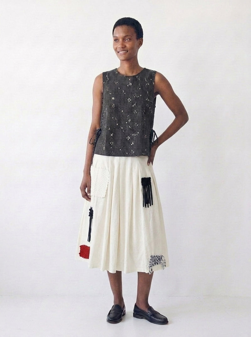The Pleated Artisan Skirt-Basket Patchwork cotton muslin skirt by World of Crow in white for women Worldwide