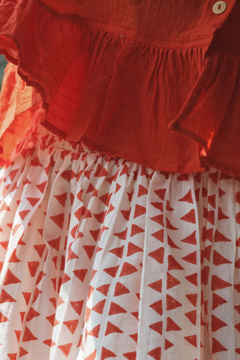 The Scarlet Frill Top by World of Crow in orange color for women Worldwide