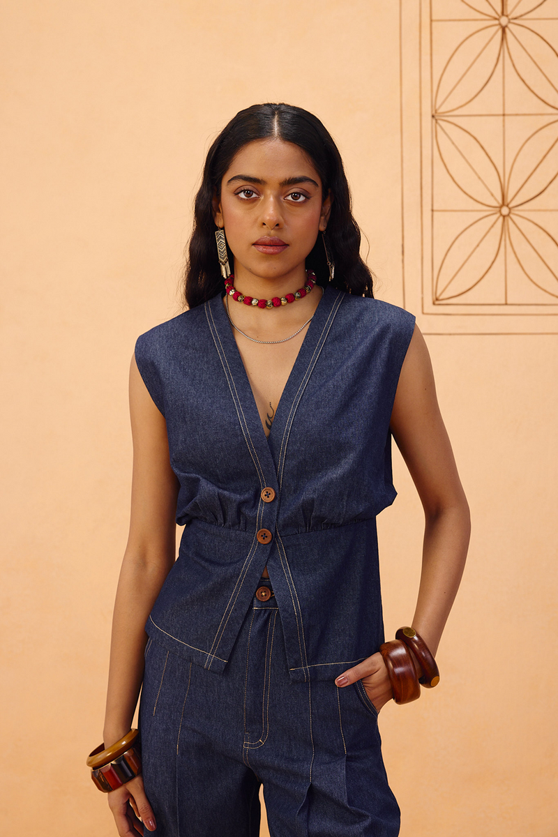 The Timeless Sustainable Denim Waistcoat denim jacket/overlay by SUI in blue for women Worldwide