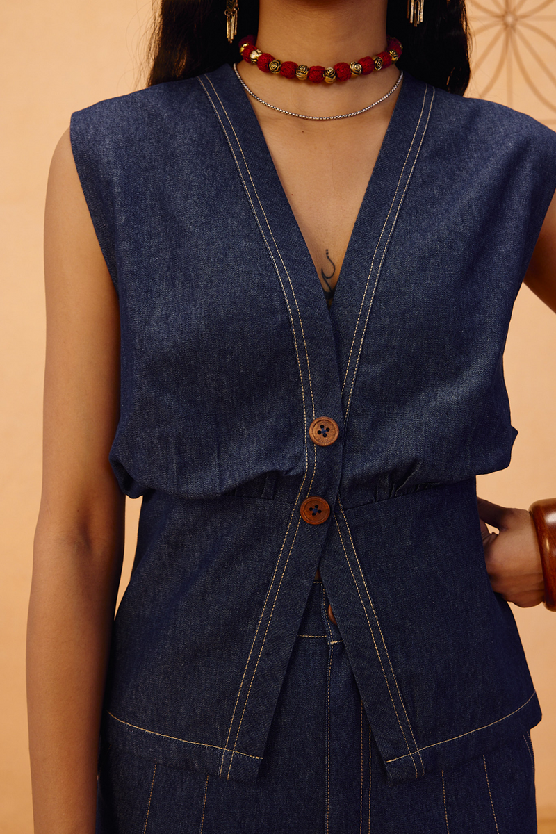 The Timeless Sustainable Denim Waistcoat denim jacket/overlay by SUI in blue for women Worldwide
