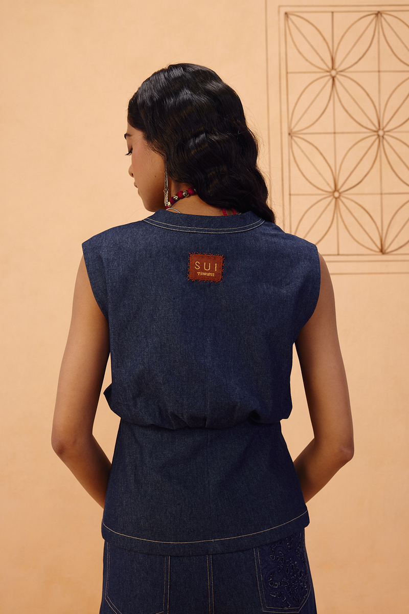 The Timeless Sustainable Denim Waistcoat denim jacket/overlay by SUI in blue for women Worldwide