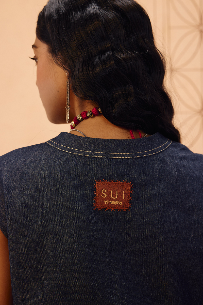 The Timeless Sustainable Denim Waistcoat denim jacket/overlay by SUI in blue for women Worldwide