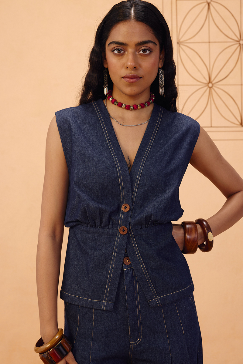 The Timeless Sustainable Denim Waistcoat denim jacket/overlay by SUI in blue for women Worldwide