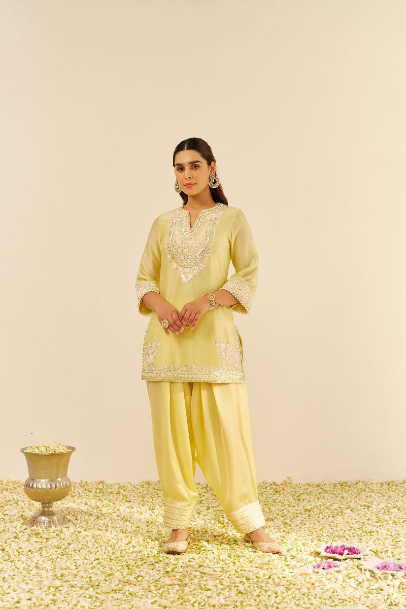 Sara - Short Kurta With Salwar And Dupatta-Lemon Yellow silk by SHEETAL BATRA in yellow color for women Worldwide