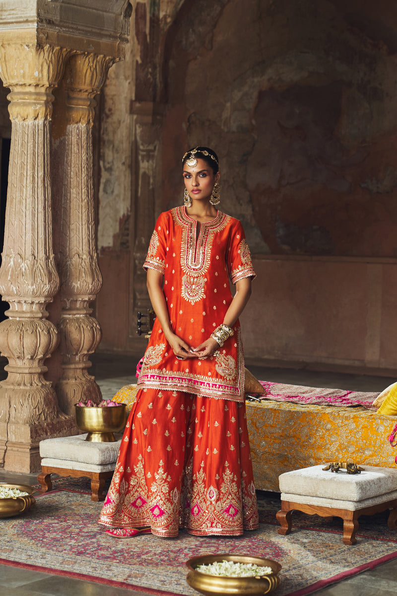 AREESHA - BURNT ORANGE SHORT KURTA WITH SHARARA AND DUPATTA silk chanderi kurta/kurta set by SHEETAL BATRA in orange for women Worldwide
