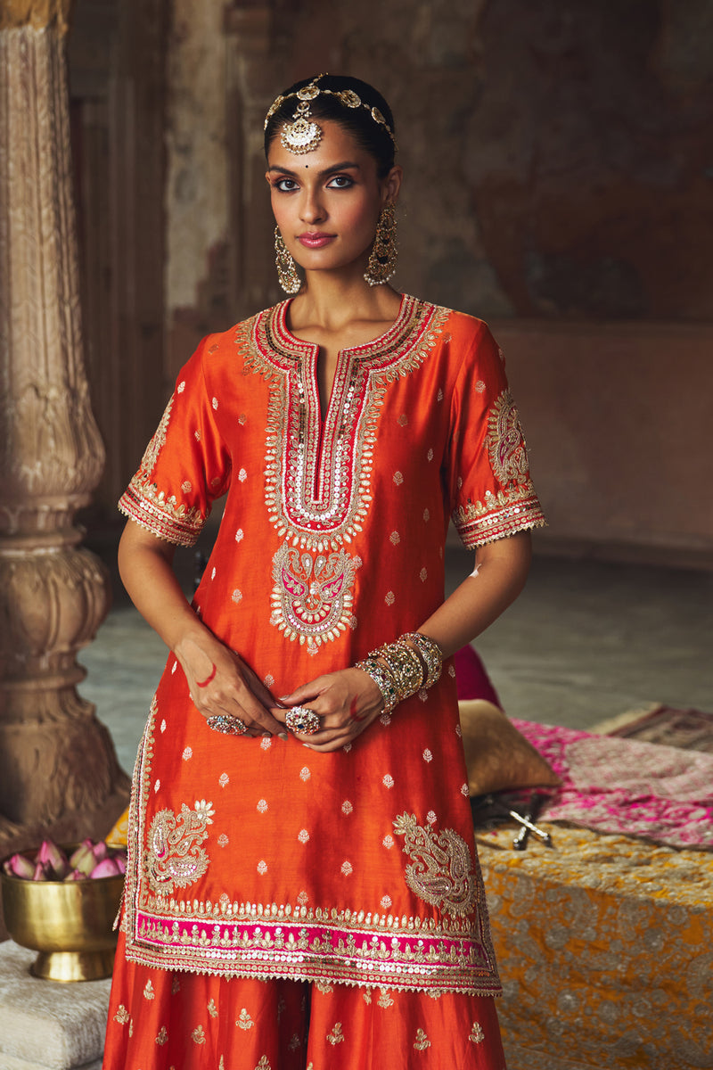 AREESHA - BURNT ORANGE SHORT KURTA WITH SHARARA AND DUPATTA silk chanderi kurta/kurta set by SHEETAL BATRA in orange for women Worldwide
