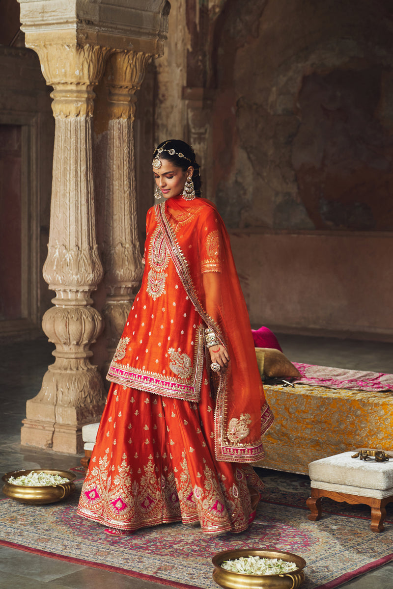 AREESHA - BURNT ORANGE SHORT KURTA WITH SHARARA AND DUPATTA silk chanderi kurta/kurta set by SHEETAL BATRA in orange for women Worldwide