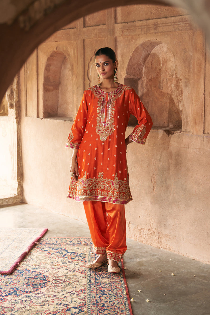 FARHANA - BURNT ORANGE SHORT KURTA WITH SALWAR AND DUPATTA chanderi silk kurta/kurta set by SHEETAL BATRA in orange for women Worldwide
