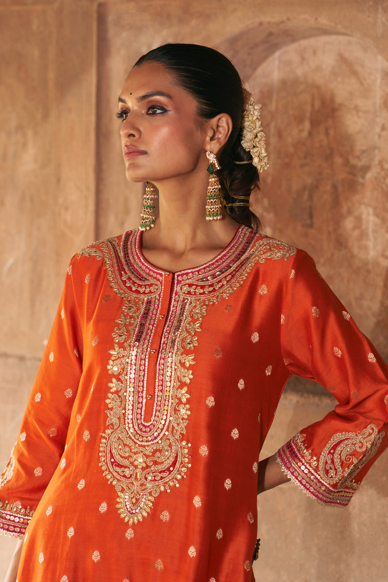 FARHANA - BURNT ORANGE SHORT KURTA WITH SALWAR AND DUPATTA chanderi silk kurta/kurta set by SHEETAL BATRA in orange for women Worldwide
