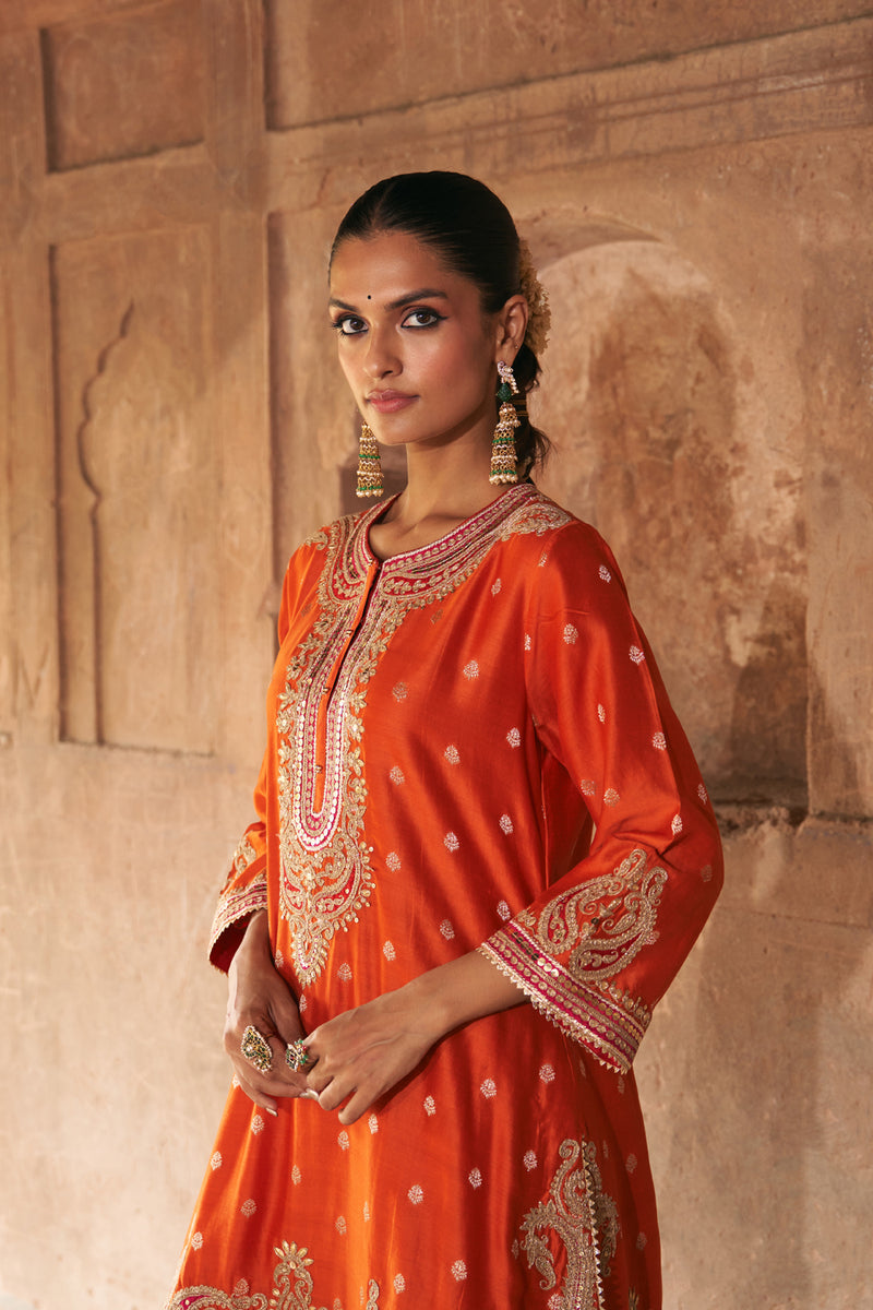 FARHANA - BURNT ORANGE SHORT KURTA WITH SALWAR AND DUPATTA chanderi silk kurta/kurta set by SHEETAL BATRA in orange for women Worldwide