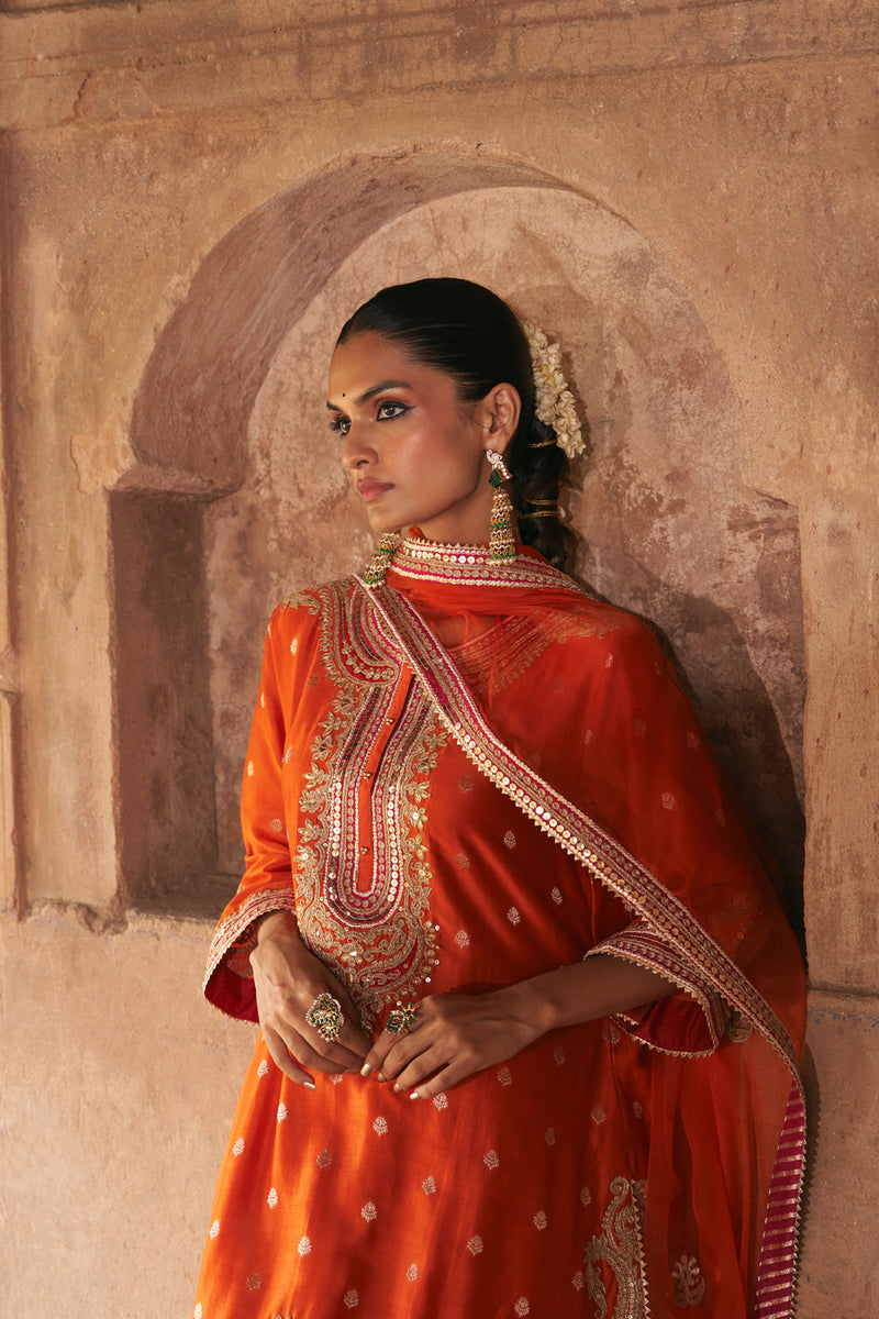 FARHANA - BURNT ORANGE SHORT KURTA WITH SALWAR AND DUPATTA chanderi silk kurta/kurta set by SHEETAL BATRA in orange for women Worldwide