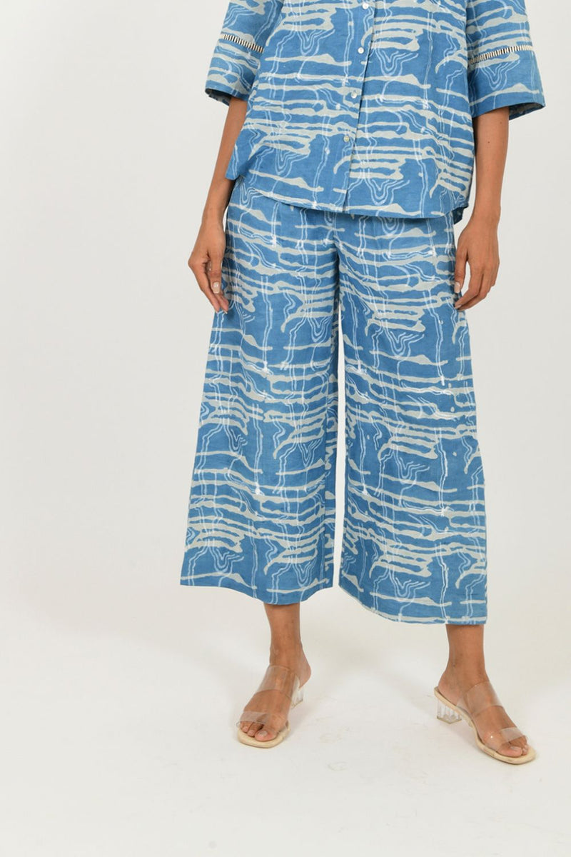 INDIGO SPLASH LINEN PANTS by Rias in blue color for women Worldwide