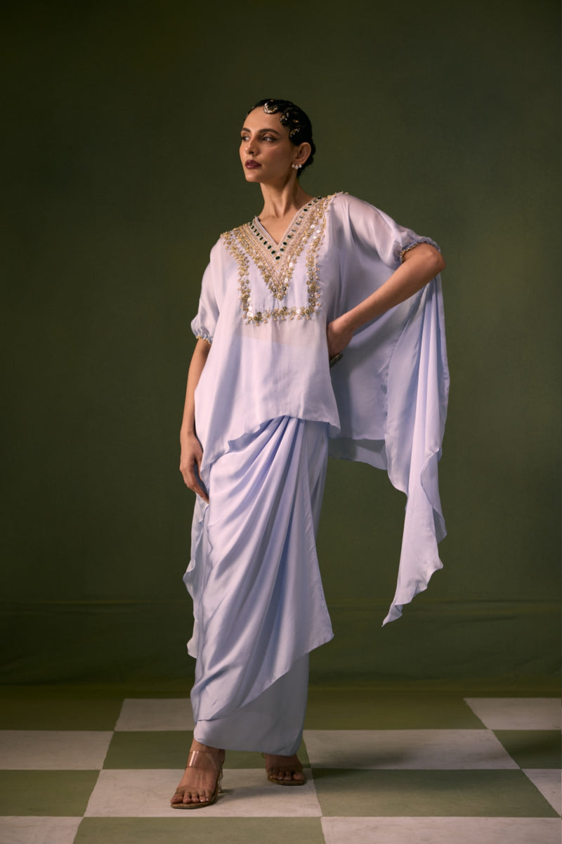 Cove Ice Blue Antifit Asymmetric Top with Wrap Skirt vegan satin, organza satin indo-western by PRAHNAAYA in sky for women Worldwide