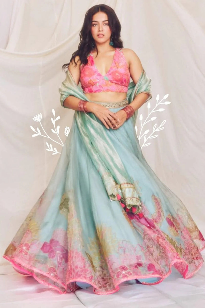 Wamiqa Gabbi Ice Blue Floral Organza Lehenga Set organza , crepe, tissue organza by Rajiramniq in ice blue for women Worldwide