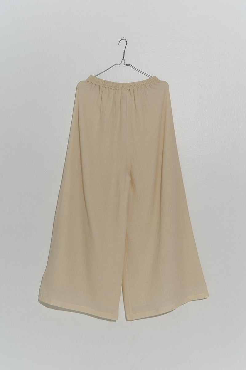 Off-White wide-legged Relaxed Pants 100% cotton by World of Crow in white color for women Worldwide