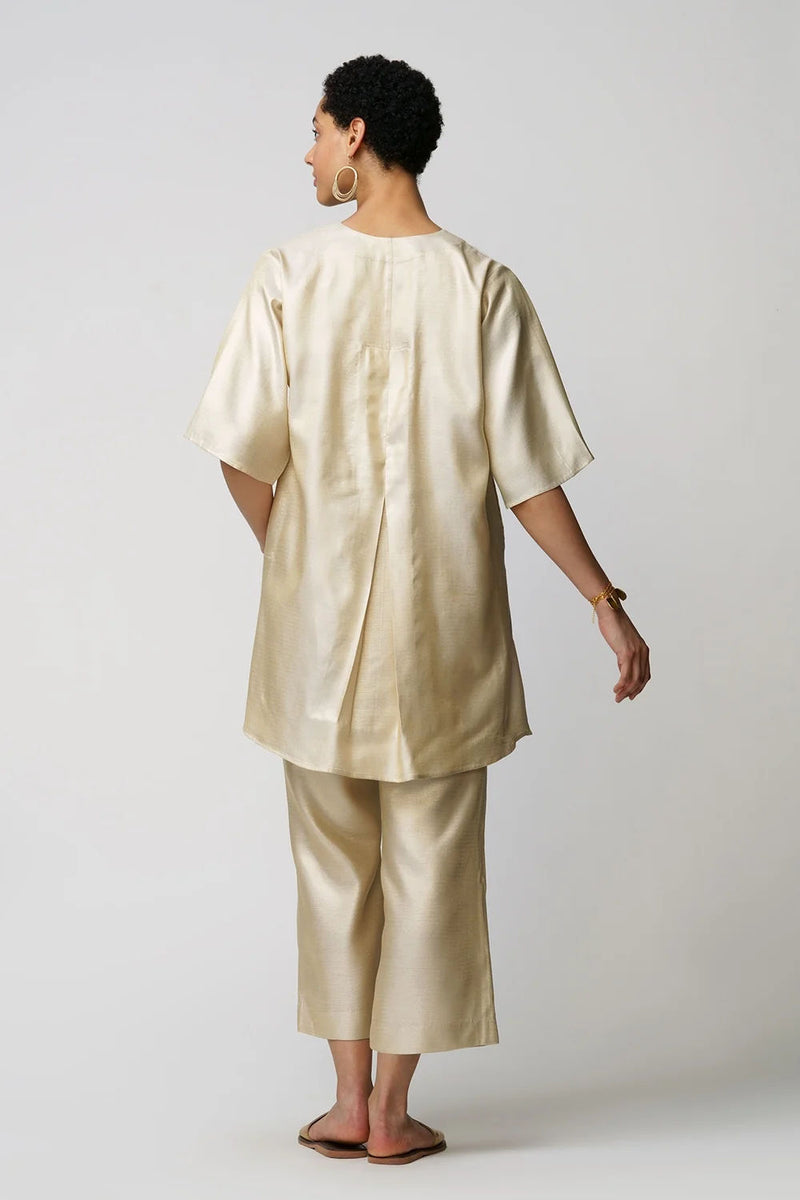 Xylia' wild peony flower bloom applique gold zari short and long tunic set zari kurta/kurta set by Malika Mathur in gold for women Worldwide
