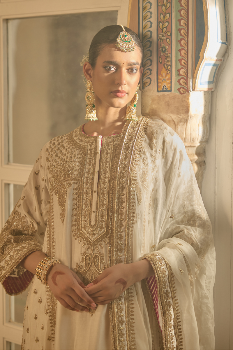 Zoya - Dabka Zardozi Embroidered Rich Banarasi Kalidaar Daisy Ivory Long Chauga Set satin by SHEETAL BATRA in ivory color for women Worldwide