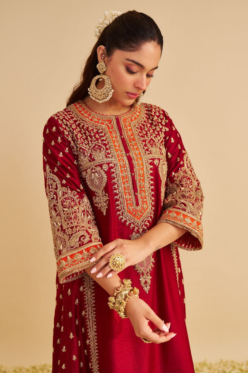 Zoya - Dabka Zardozi Embroidered Rich Banarasi Kalidaar Deep Red Long Chauga Set satin by SHEETAL BATRA in red color for women Worldwide