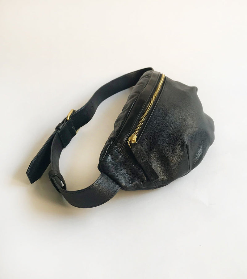 Black fanny pack by Khara Kapas for women Worldwide