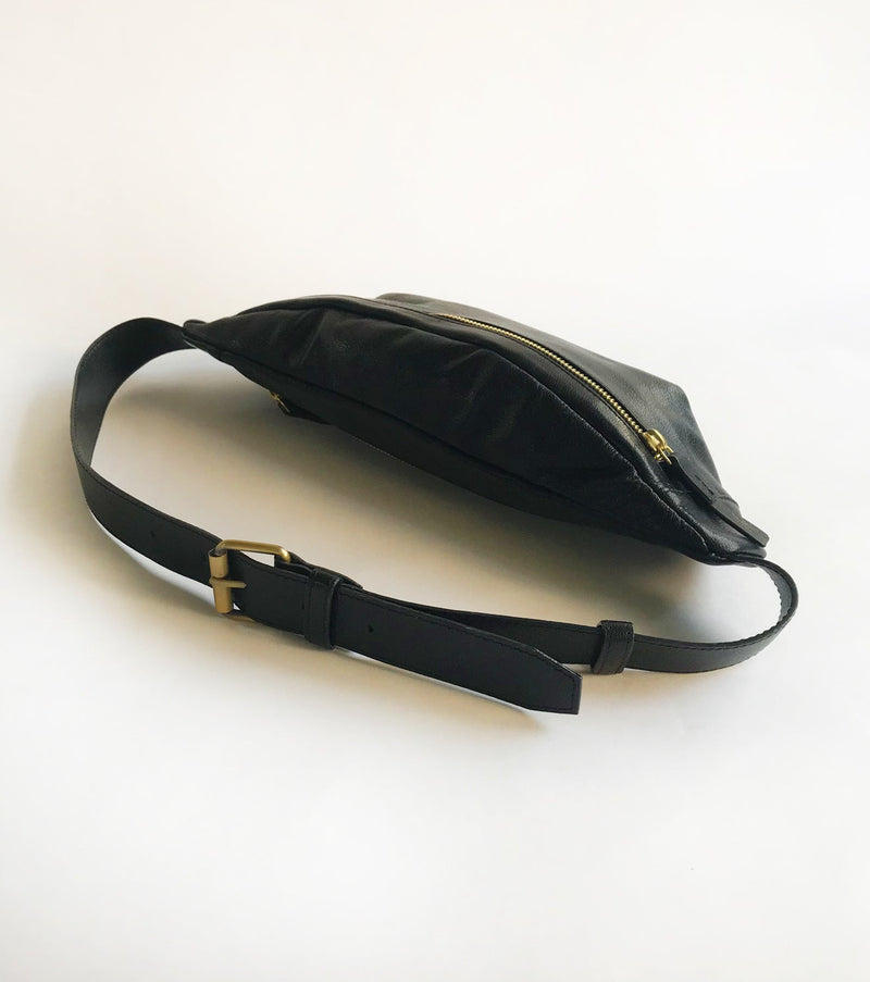 Black fanny pack by Khara Kapas for women Worldwide