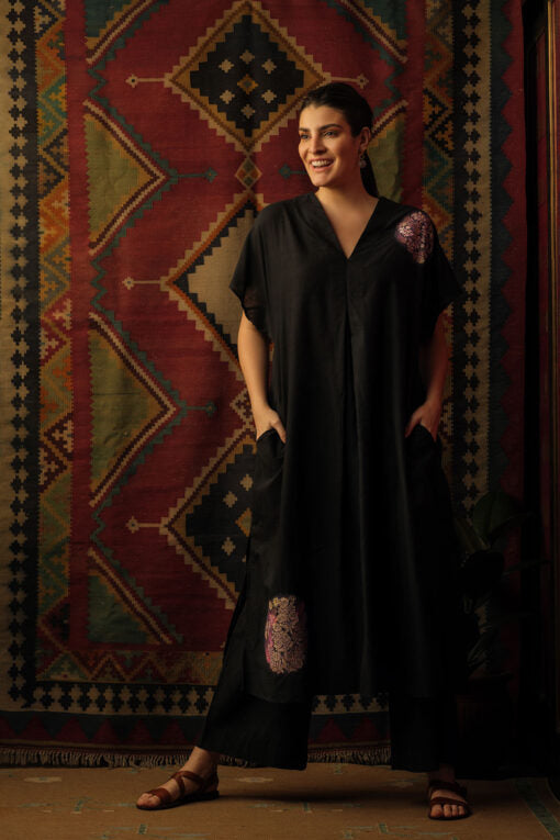 ‘Chakri’ Appliqué Embroidered kaftan black Lounge Wear by Mallika Mathur in black color for women Worldwide